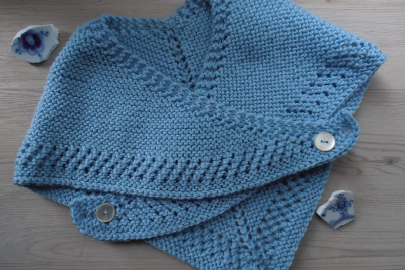 Close-up of a soft blue knitted wool garment